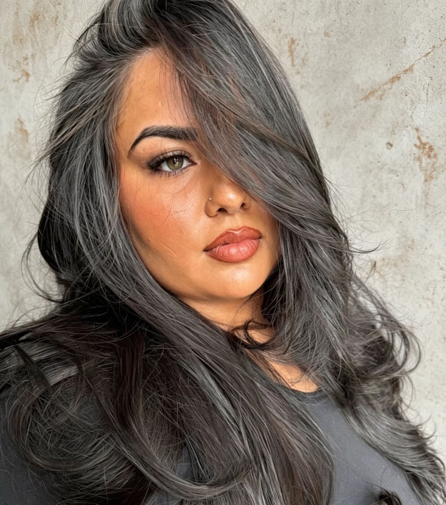 Smoky charcoal brunette with soft layers